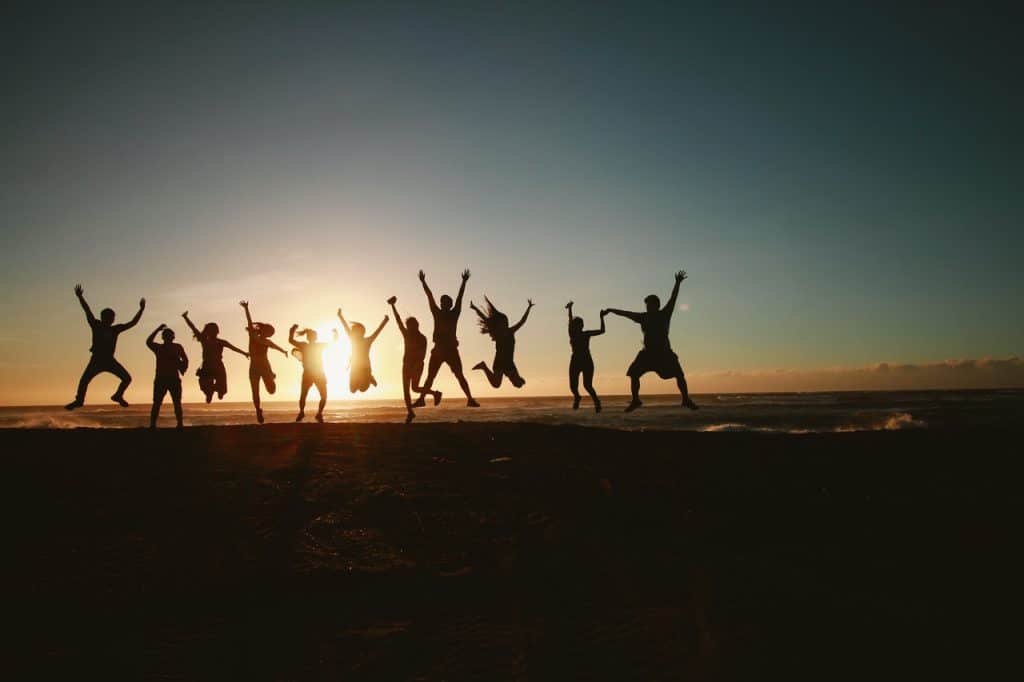 bunch of people joying under the sun